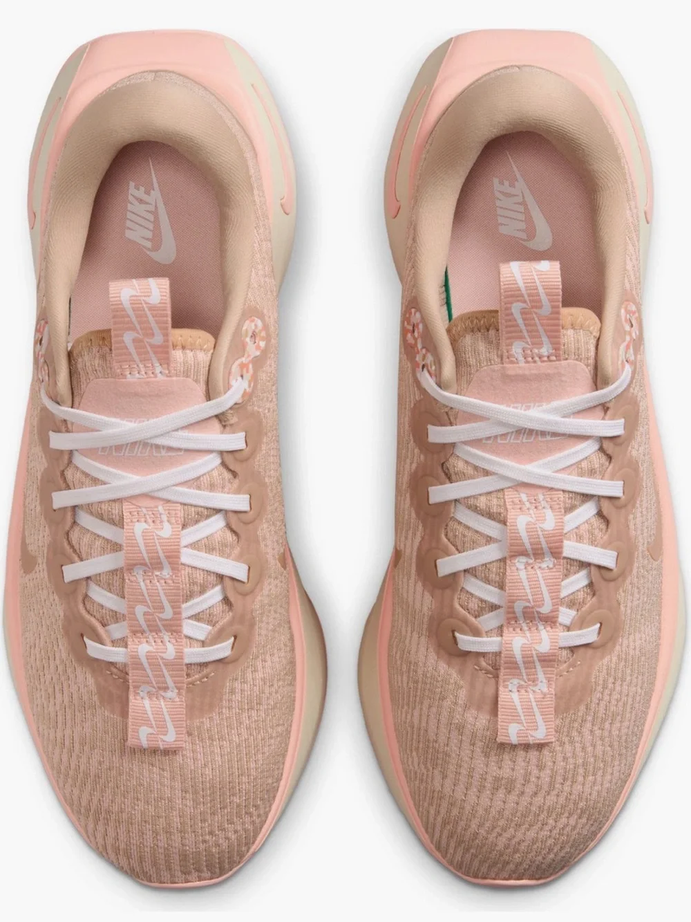 Nike Women’s Peach/Pink Wave-Soled “Motiva” Athletic Shoe